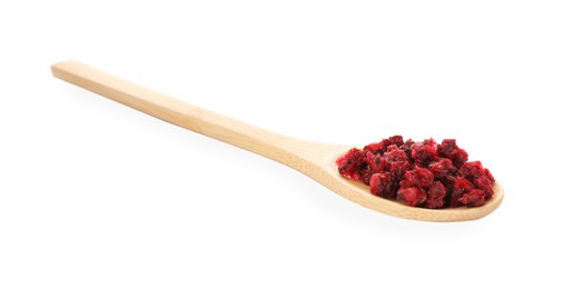 Dried red currants in wooden spoon on white background
