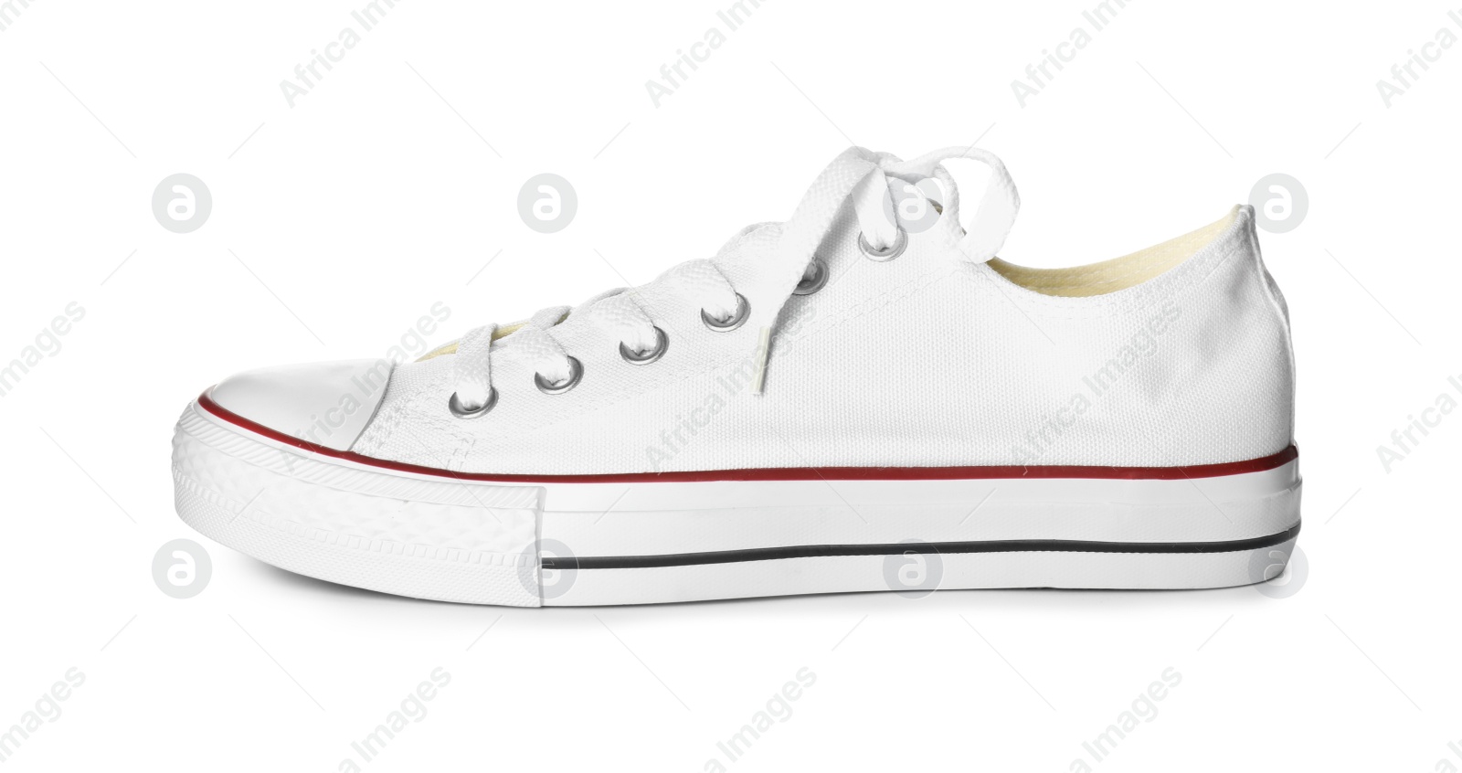 Photo of One sneaker isolated on white. Trendy shoes