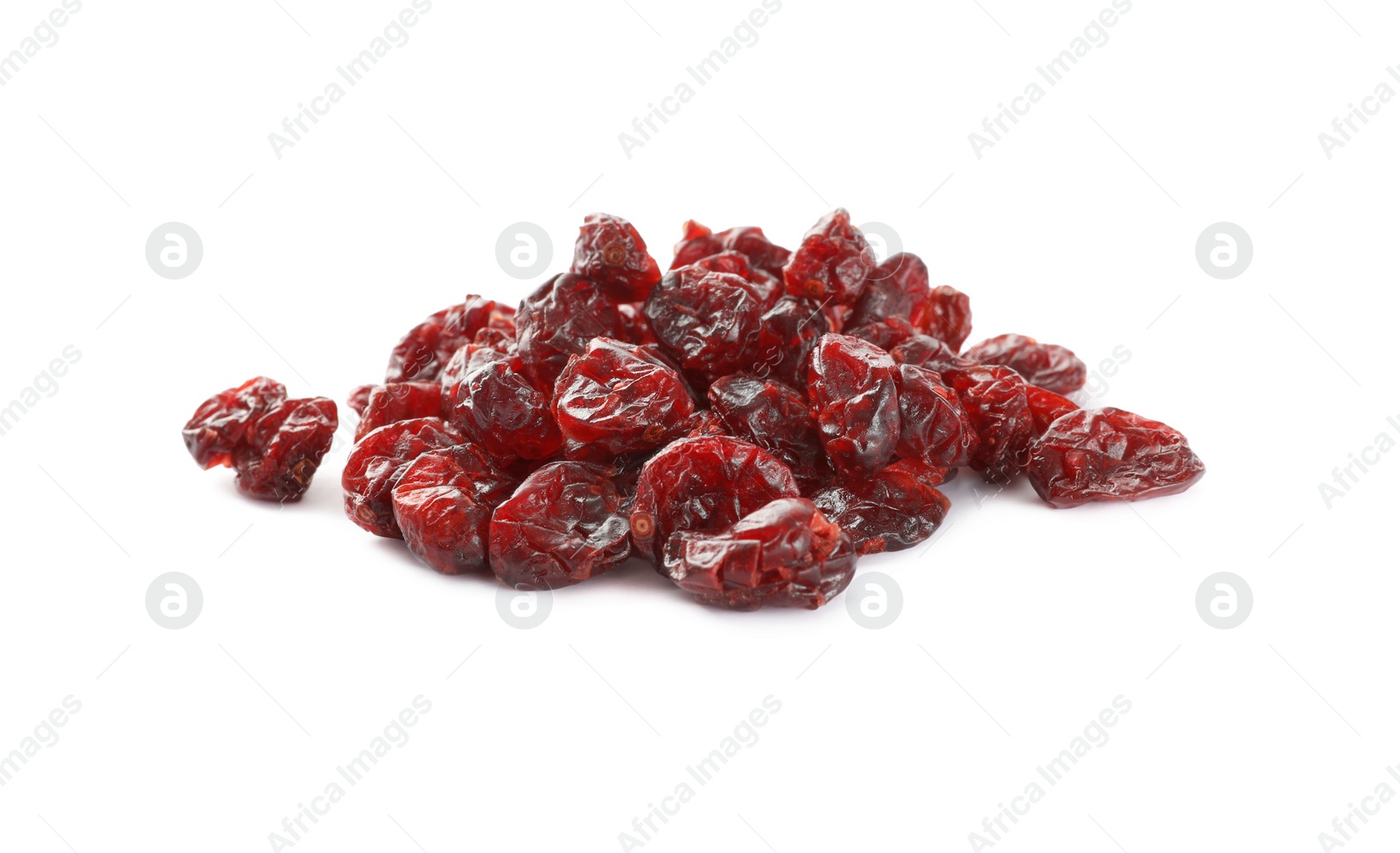 Photo of Pile of tasty dried cranberries isolated on white