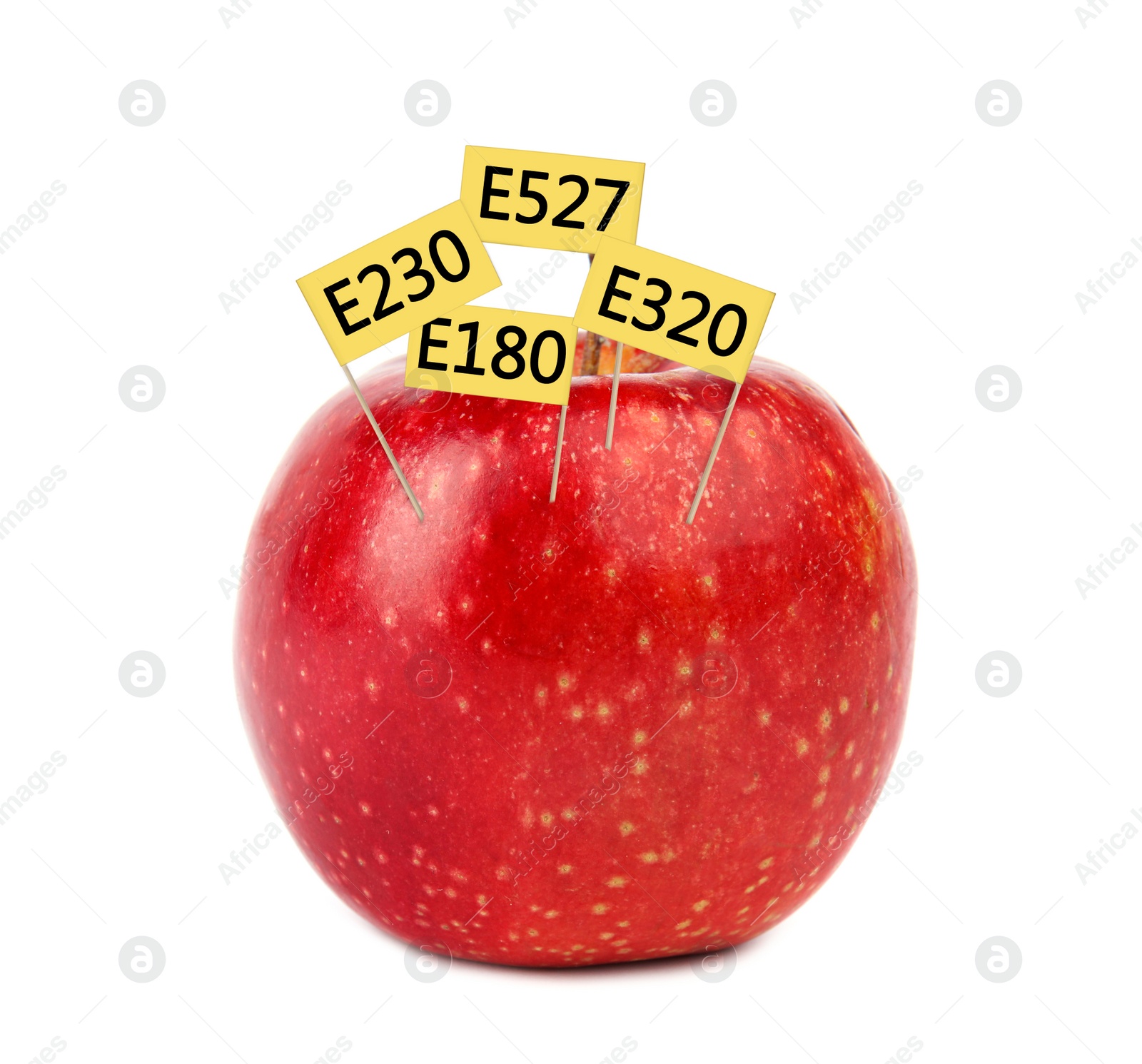 Image of Fresh apple with E numbers isolated on white. Harmful food additives 
