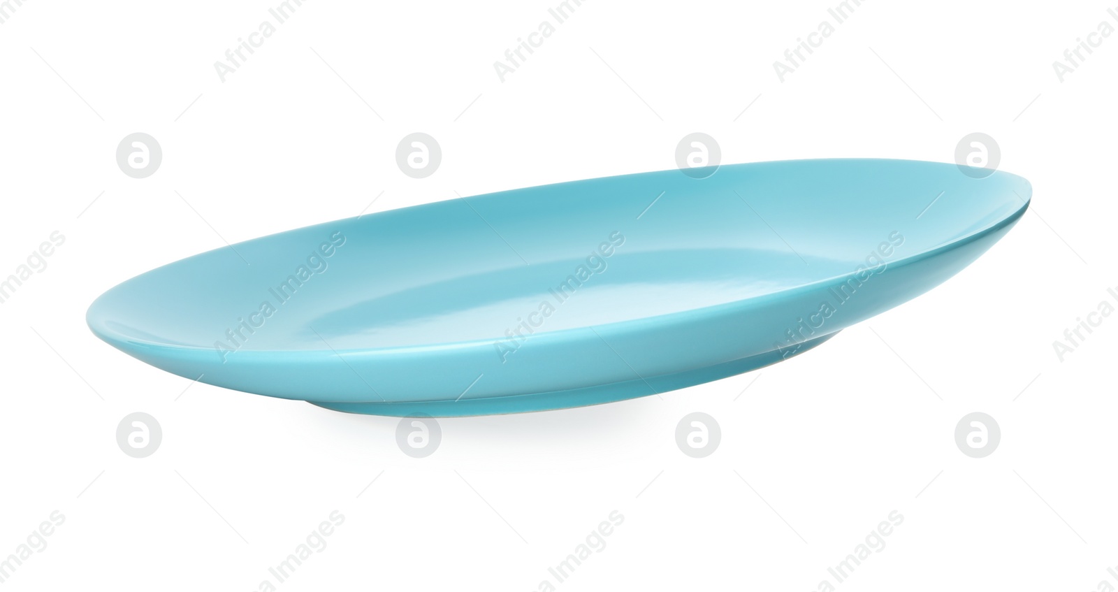 Photo of Empty light blue plate isolated on white