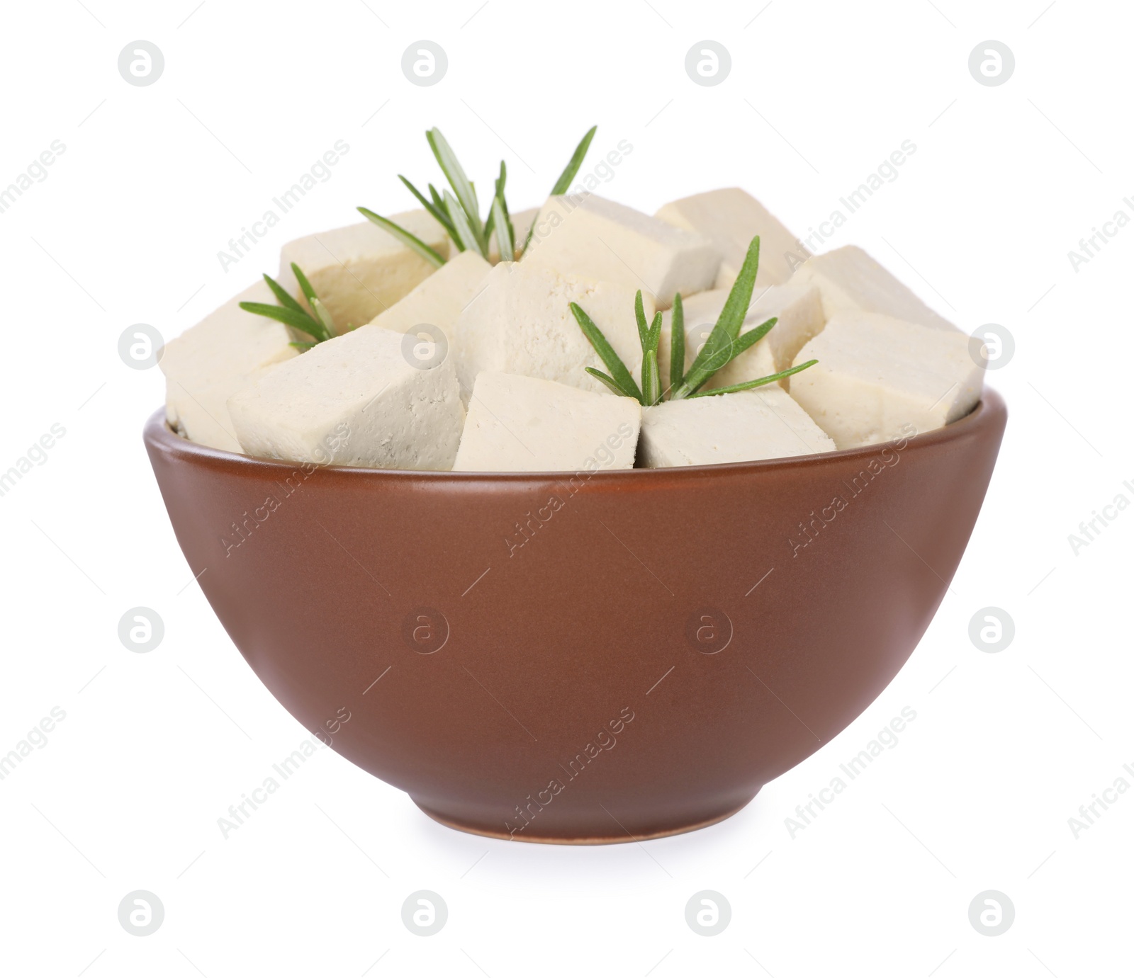 Photo of Bowl with delicious tofu and rosemary isolated on white