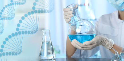 Image of Scientist holding Florence flask with blue liquid for analysis in laboratory, closeup. Banner design  