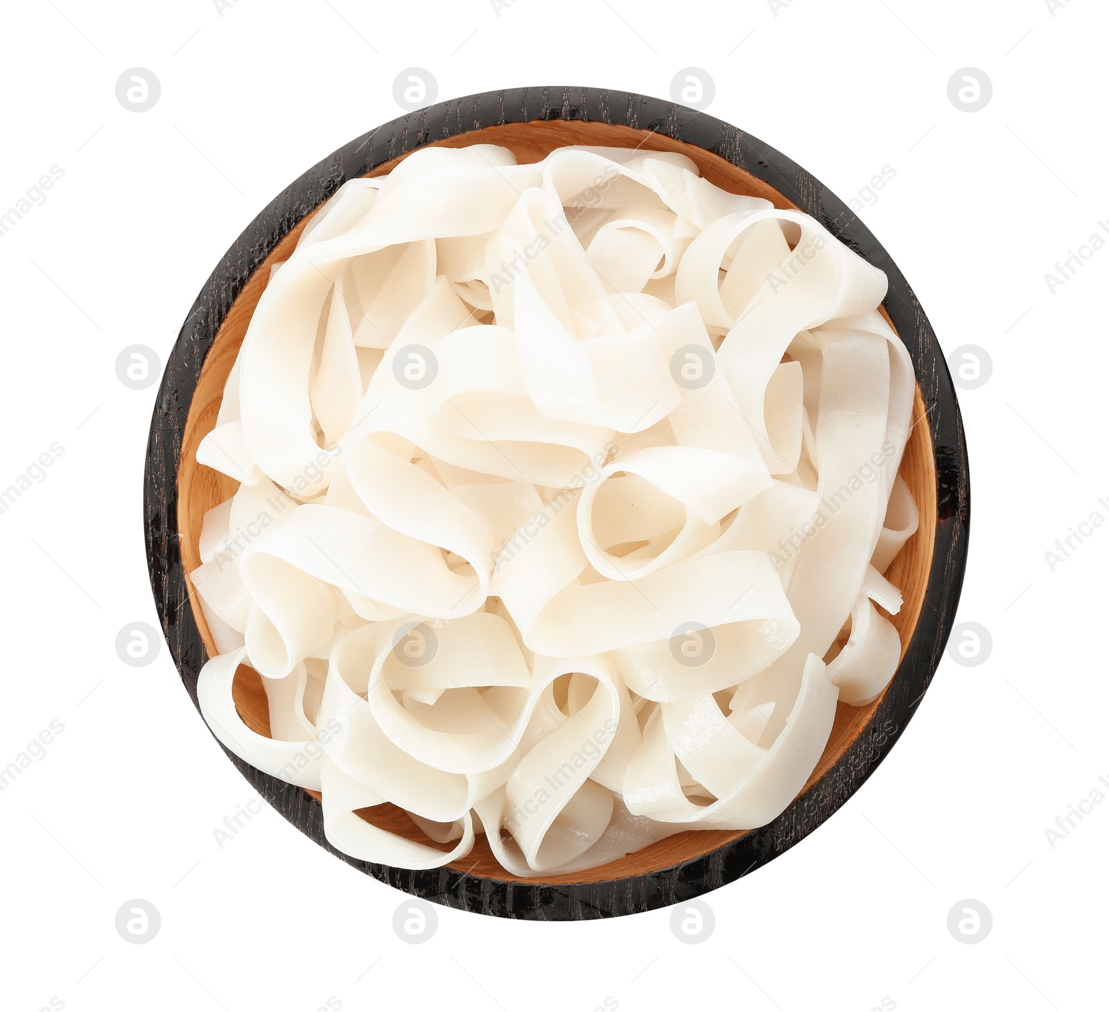 Photo of Black wooden plate with rice noodles isolated on white, top view
