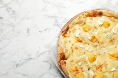 Hot cheese pizza Margherita on marble table, top view. Space for text