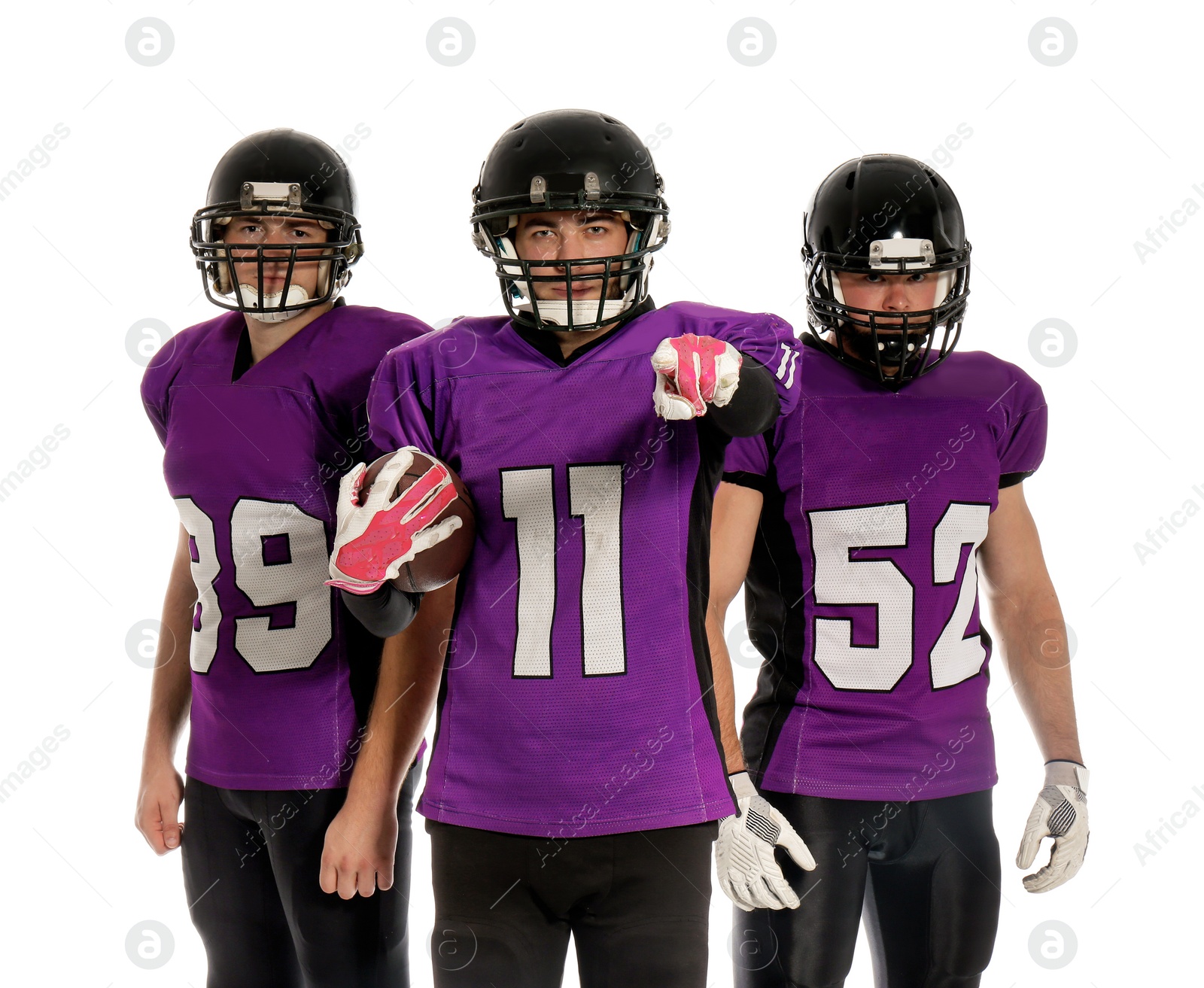 Photo of American football players in uniform on white background