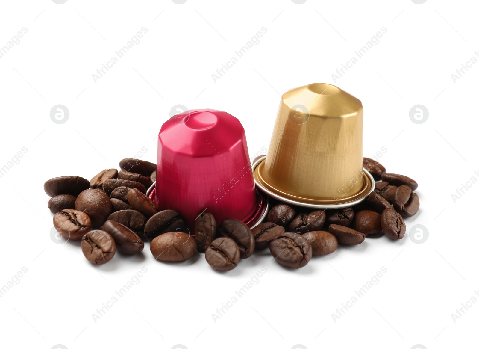 Photo of Coffee capsules and beans isolated on white