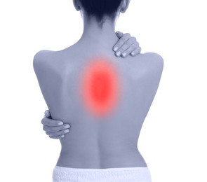 Woman suffering from back pain on white background