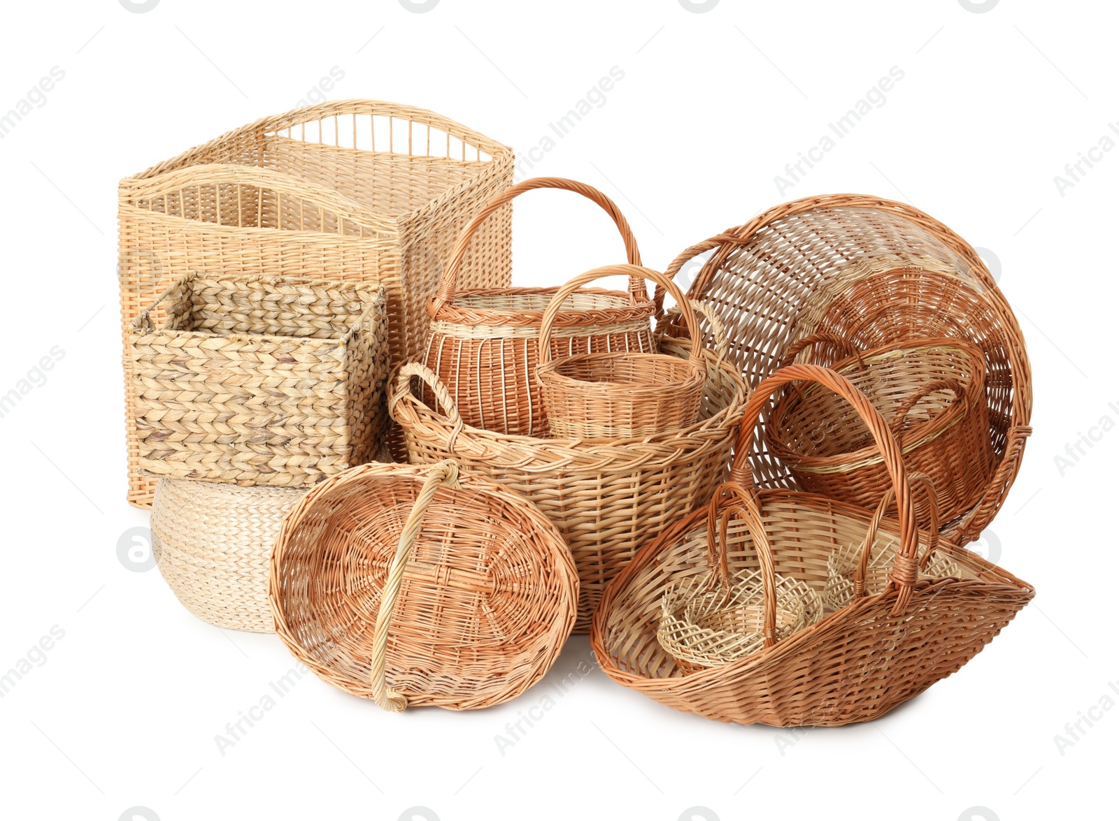 Photo of Many different wicker baskets isolated on white