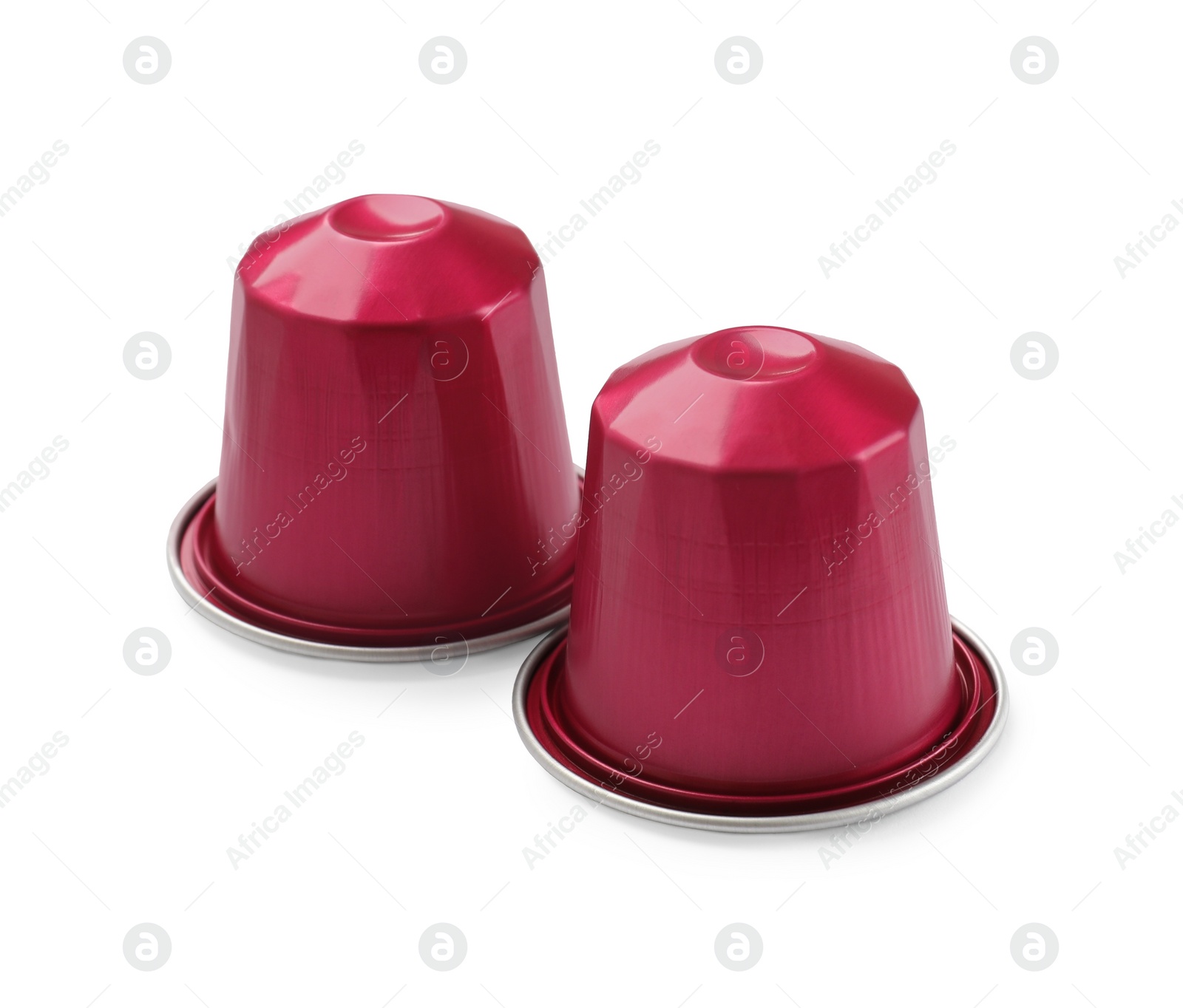 Photo of Two plastic coffee capsules isolated on white