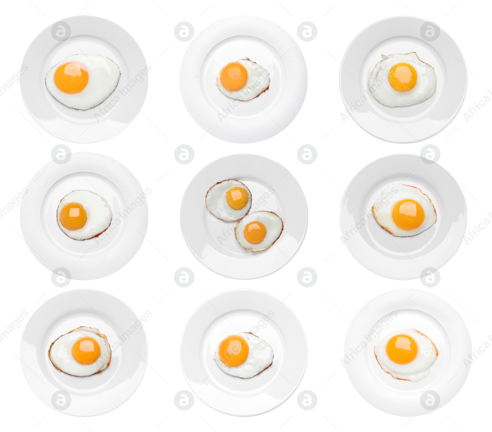 Image of Set with tasty fried eggs on white background, top view