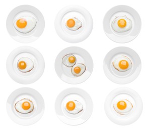 Set with tasty fried eggs on white background, top view
