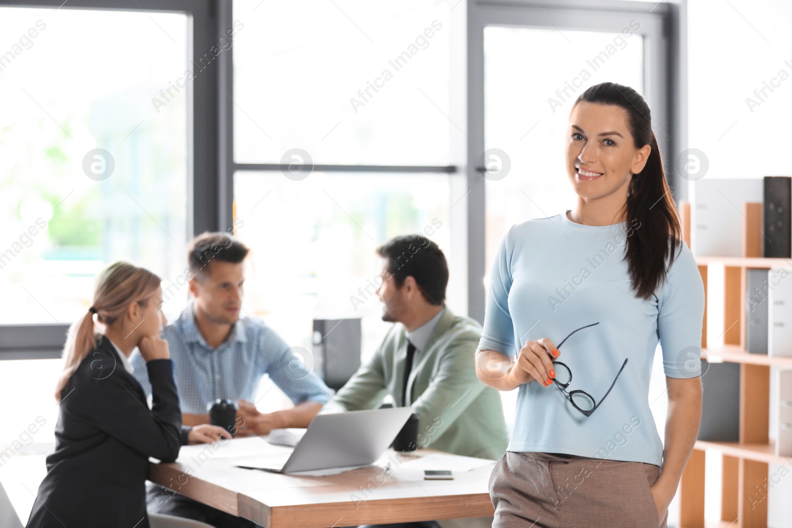 Photo of Office employees having business training at workplace