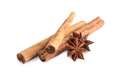 Cinnamon sticks and anise stars isolated on white