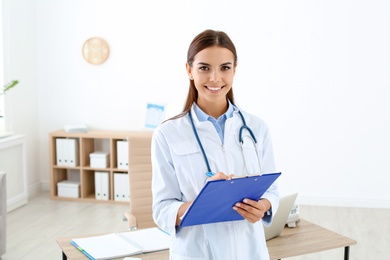 Female medical assistant working in clinic. Health care service