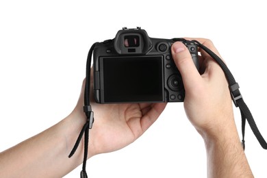 Photographer holding modern camera on white background, closeup