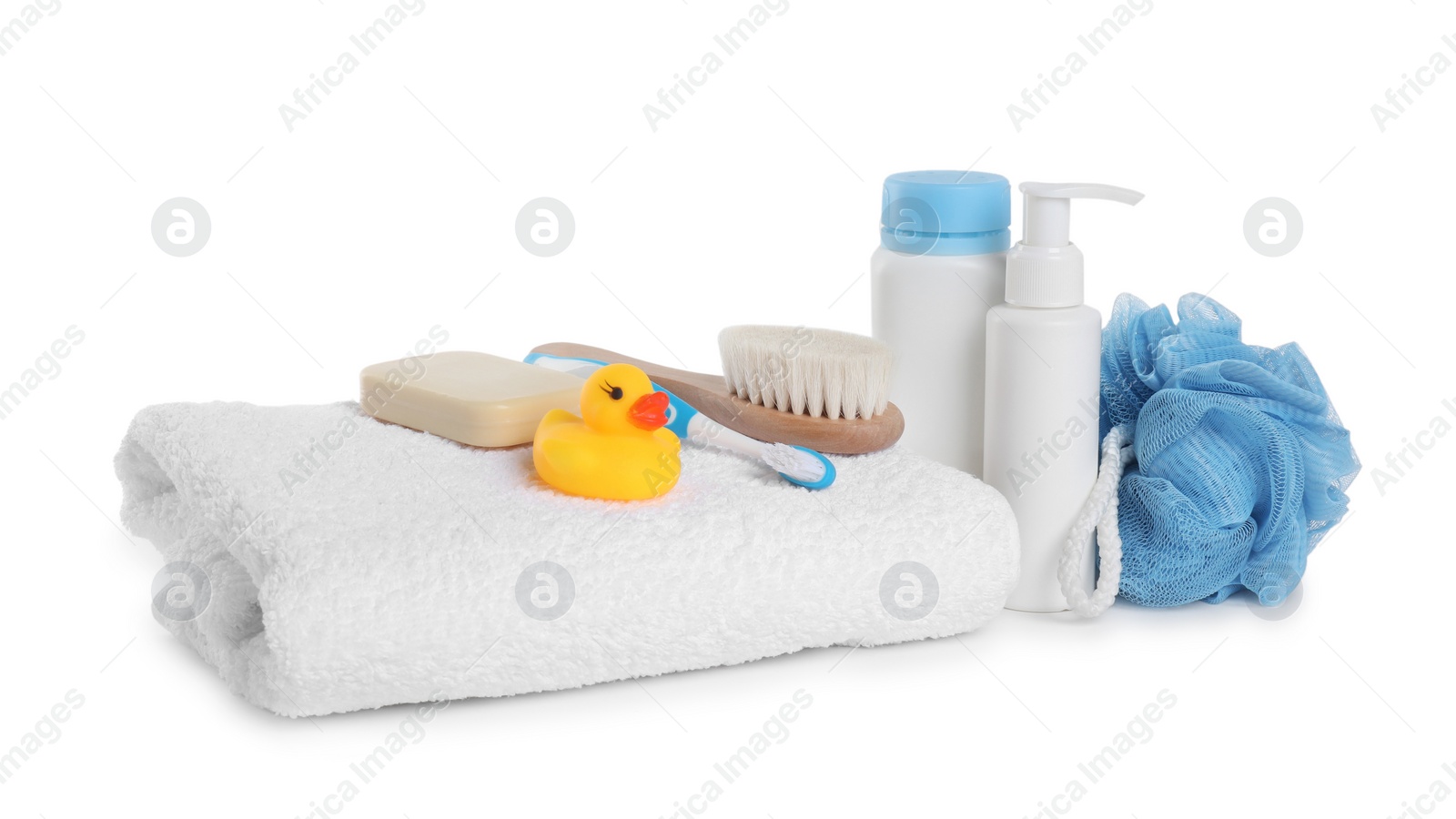 Photo of Baby cosmetic products, bath duck, toothbrush and towel isolated on white