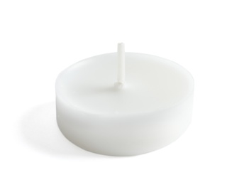 Photo of New small wax candle on white background