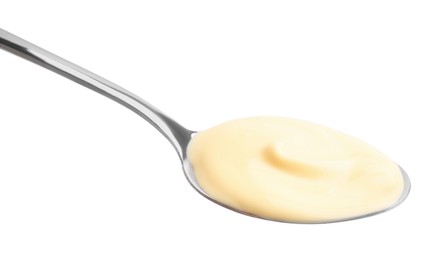 Photo of Spoon with delicious cheese sauce isolated on white