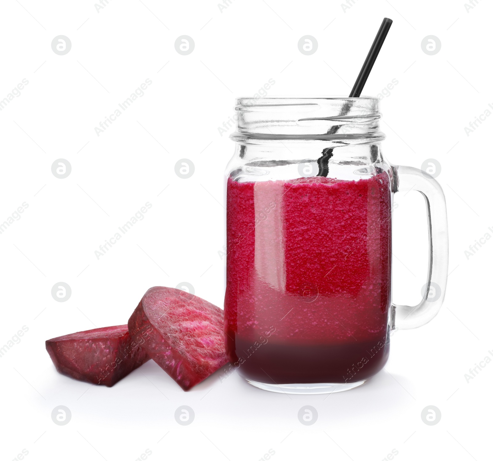 Photo of Mason jar with beet juice and fresh vegetable on white background