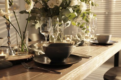 Festive table setting with beautiful tableware and decor indoors