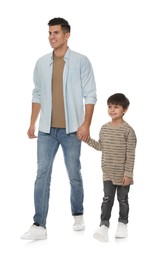 Little boy with his father on white background
