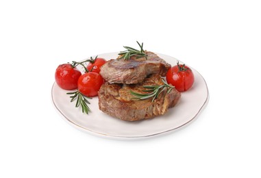 Photo of Plate of delicious fried meat with rosemary and tomatoes isolated on white