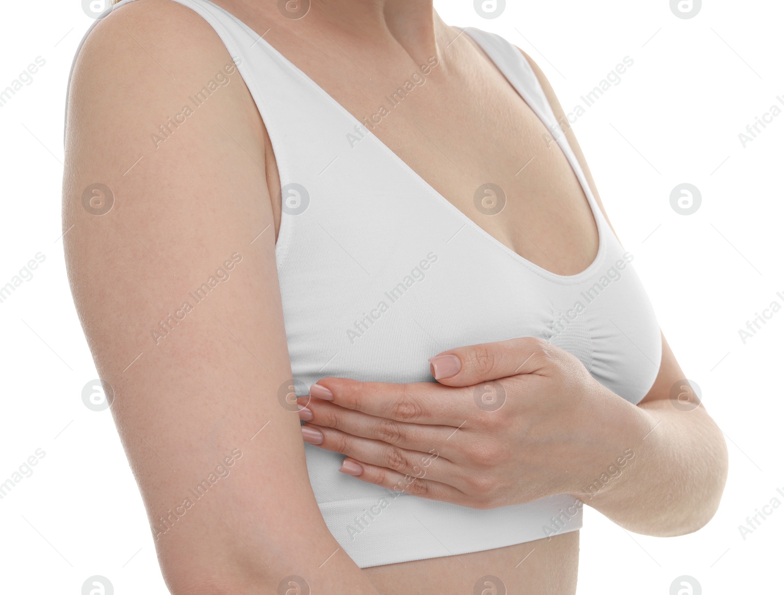 Photo of Mammology. Young woman doing breast self-examination on white background, closeup