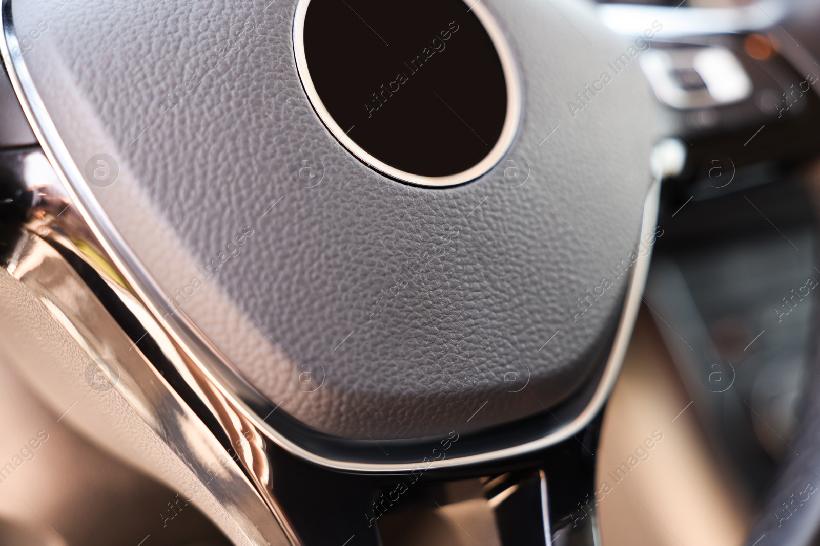 Photo of Safety airbag sign on steering wheel inside car