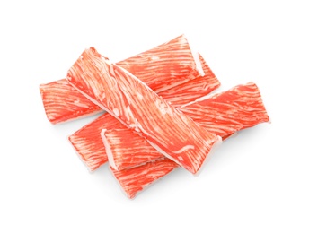 Photo of Delicious fresh crab sticks isolated on white, top view