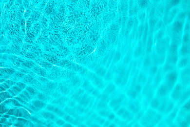 Image of Swimming pool with clean water as background. Summer vacation