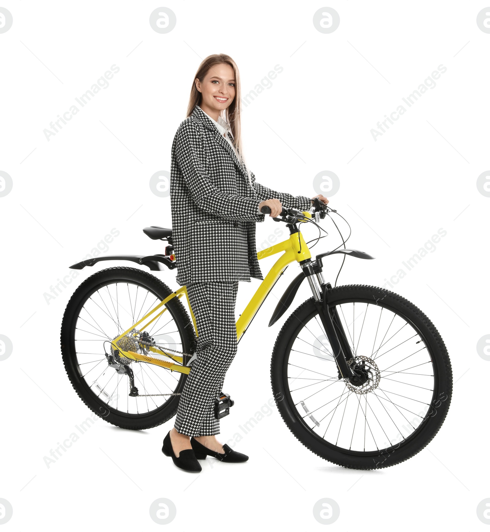 Photo of Young businesswoman with bicycle on white background