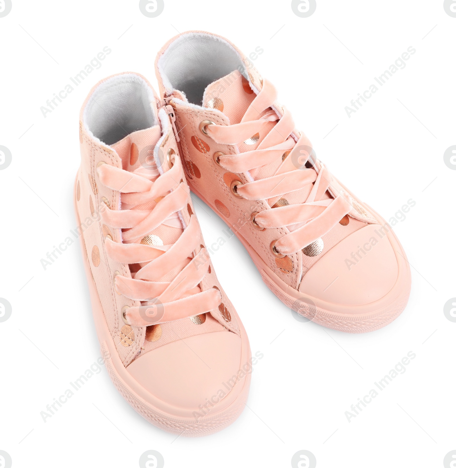 Photo of Pair of stylish child shoes on white background