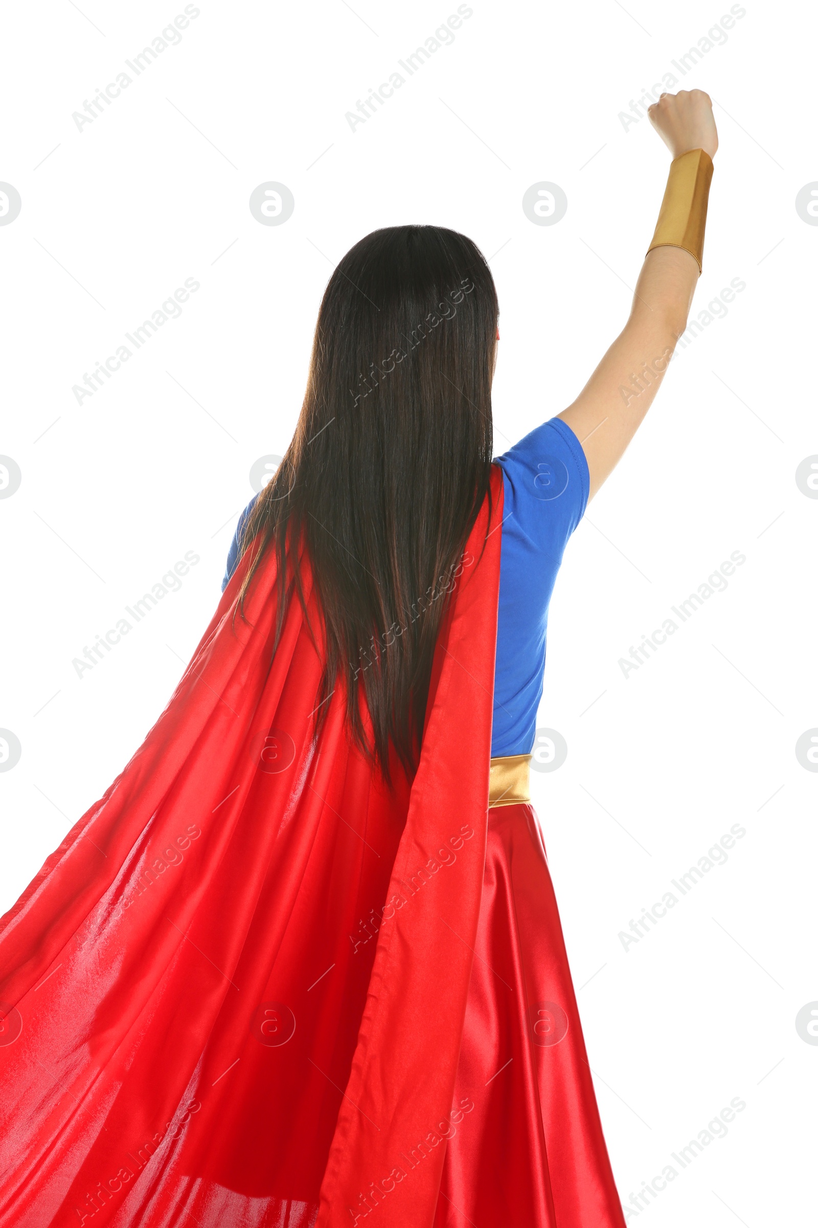 Photo of Confident young woman wearing superhero costume on white background, back view