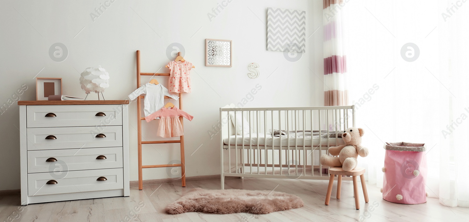 Image of Baby room interior with comfortable crib. Banner design