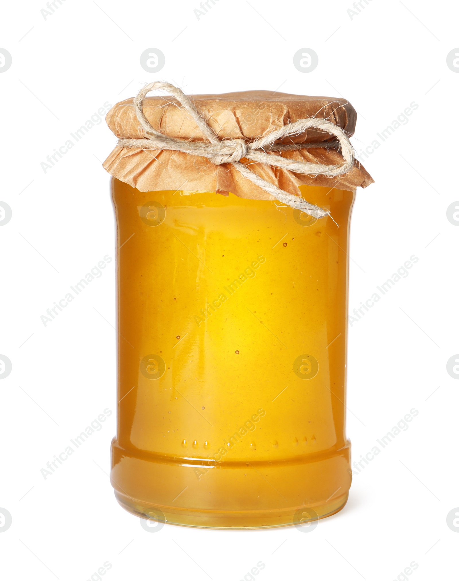 Photo of Tasty natural honey in glass jar isolated on white