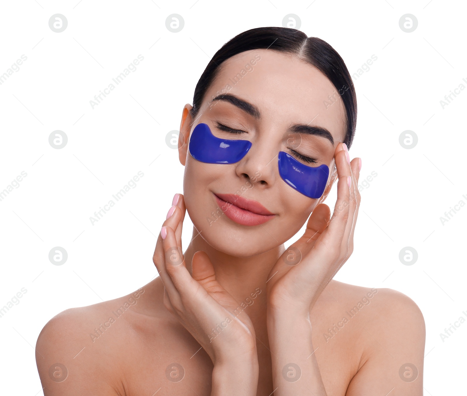 Photo of Beautiful young woman with under eye patches on white background