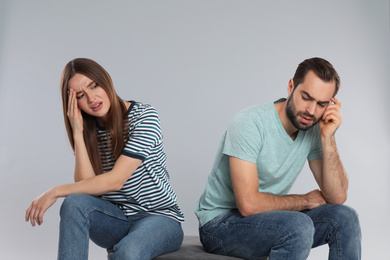 Photo of Couple with relationship problems on light grey background