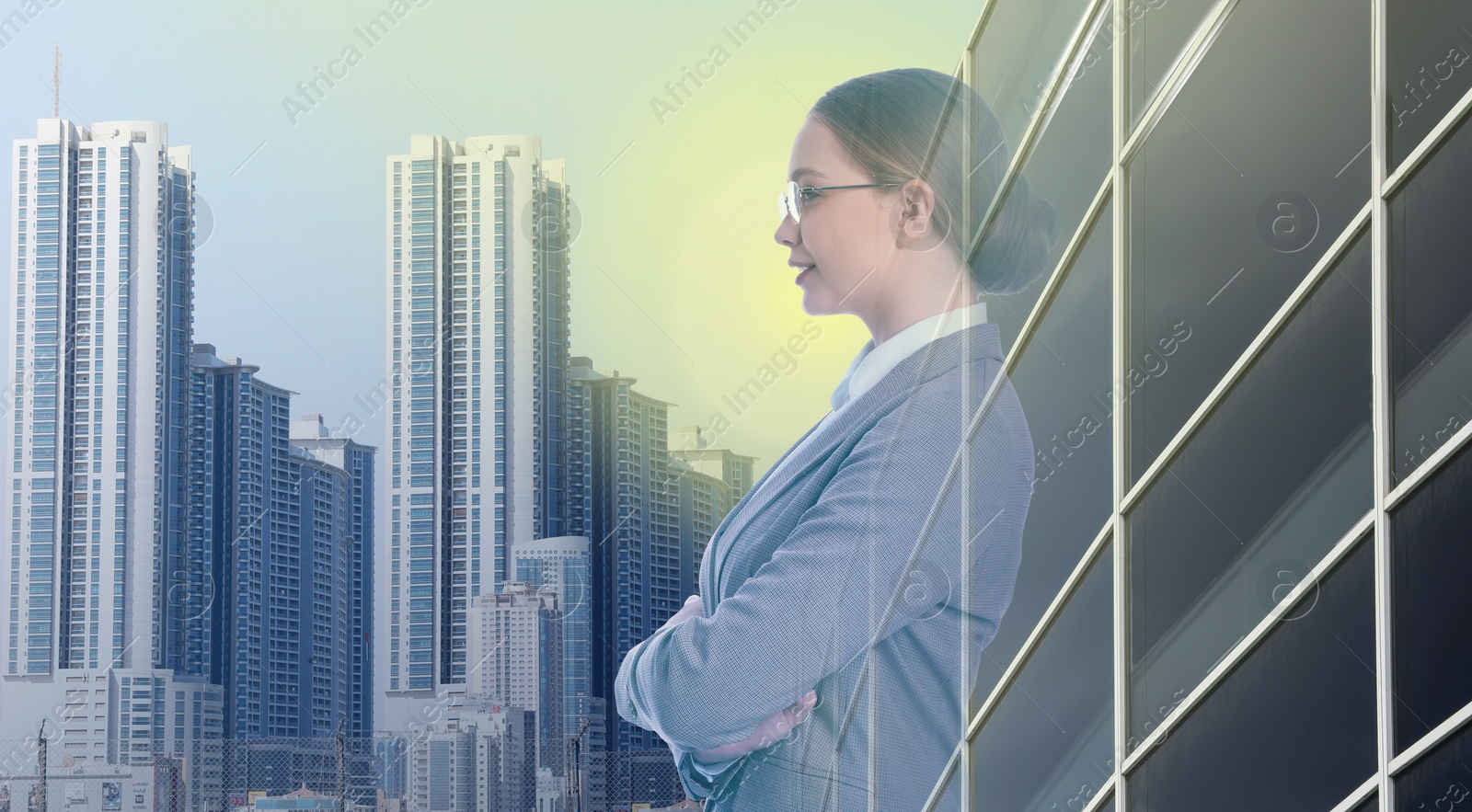Image of Multiple exposure of businesswoman, modern building and cityscape
