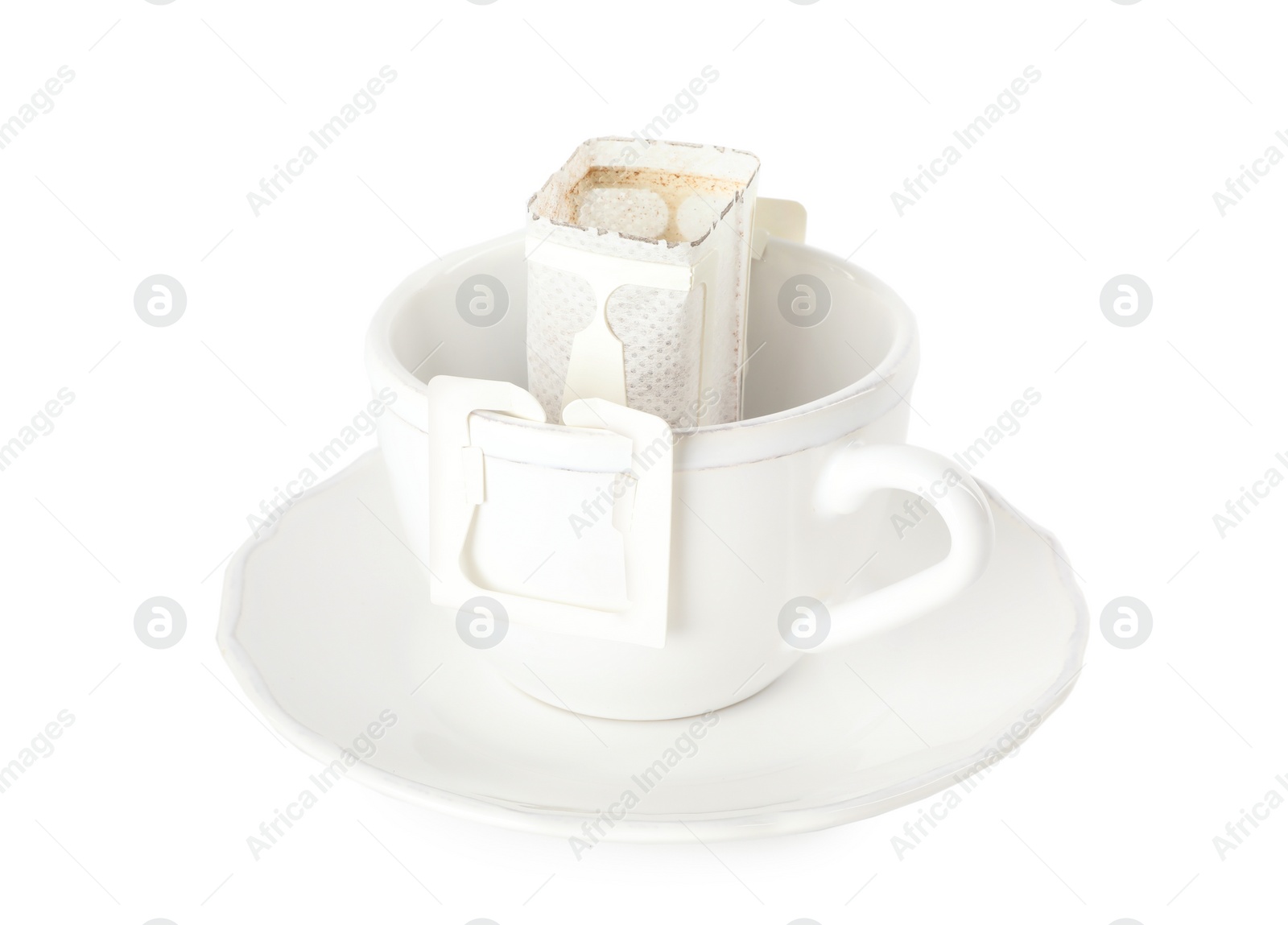 Photo of Cup with drip coffee bag isolated on white