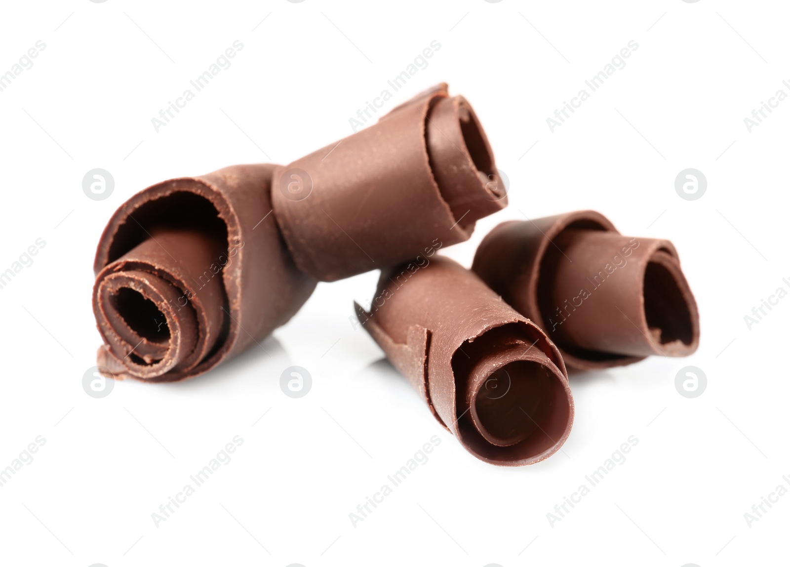 Photo of Yummy chocolate curls for decor on white background