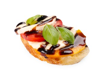 Photo of Delicious bruschetta with mozzarella cheese, tomatoes and balsamic vinegar isolated on white
