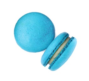 Photo of Delicious light blue macarons on white background, top view