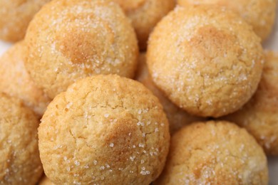 Photo of Tasty sweet sugar cookies as background, closeup