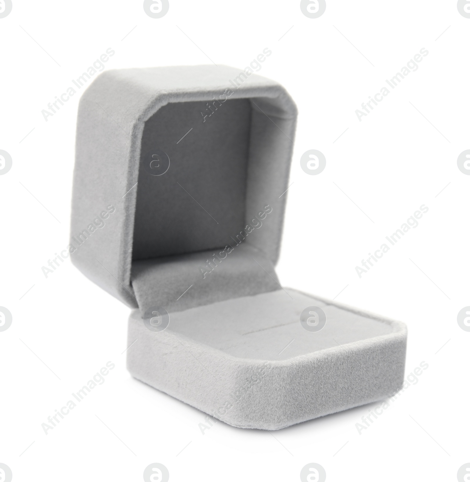 Photo of Open light grey ring box isolated on white