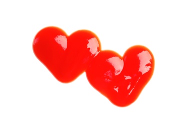Photo of Hearts made with tomato sauce isolated on white, top view