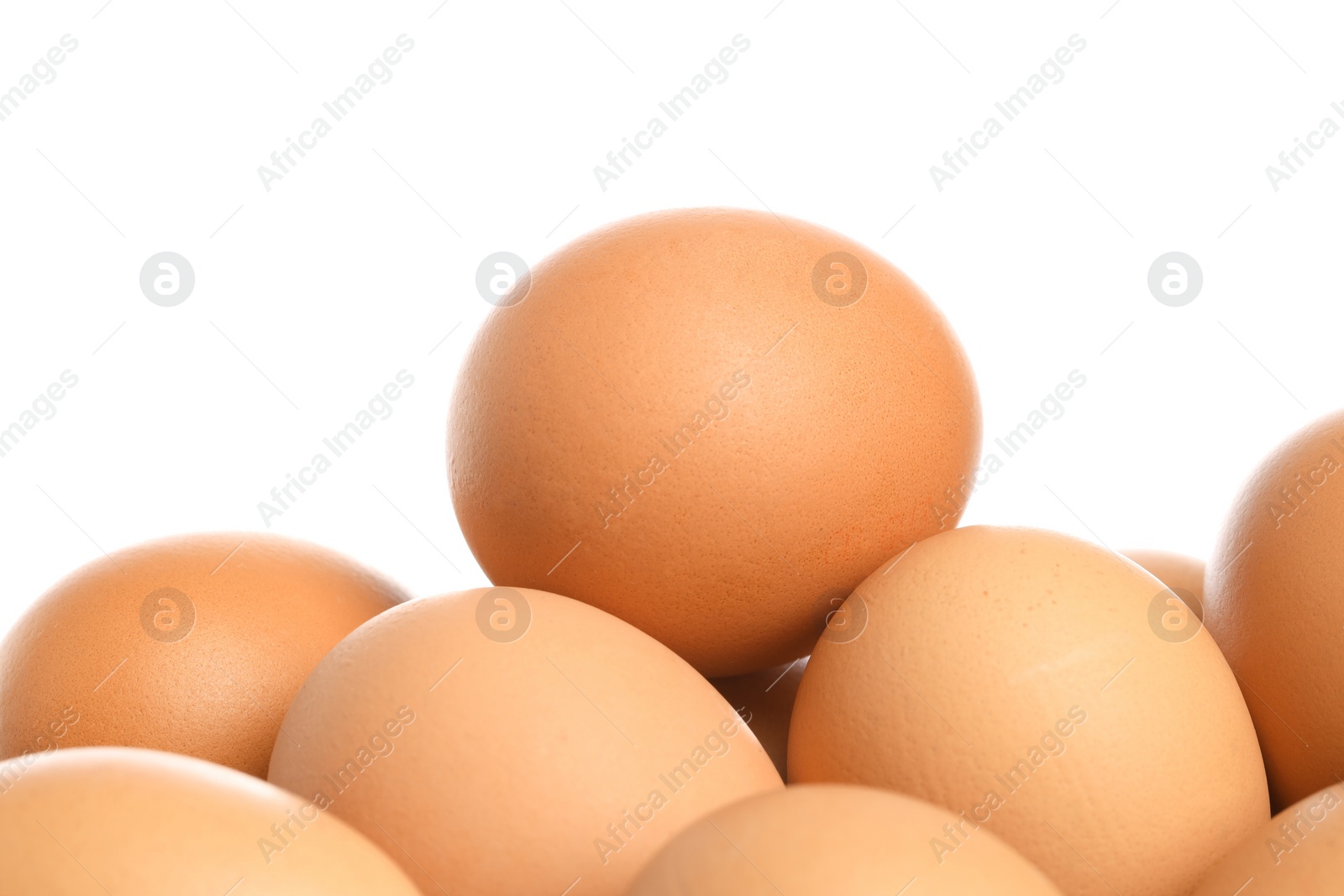 Photo of Many brown chicken eggs isolated on white