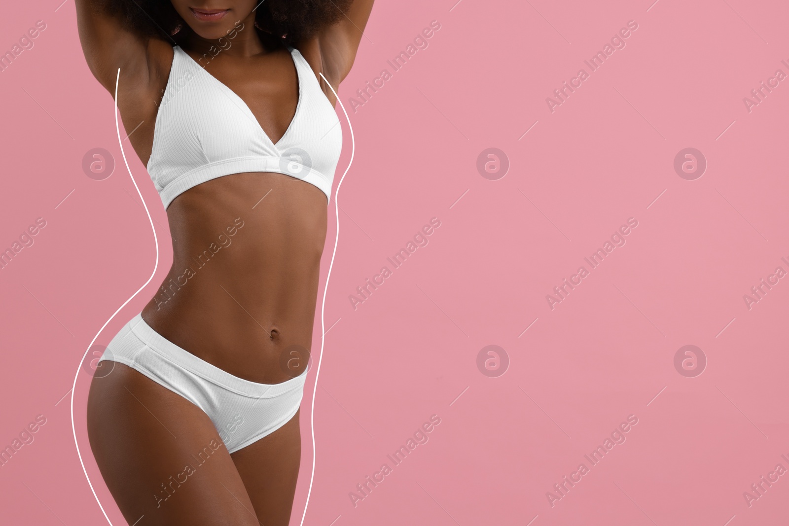 Image of Woman showing her beautiful figure on pink background, closeup. Space for text. Her body outline before cosmetic treatment