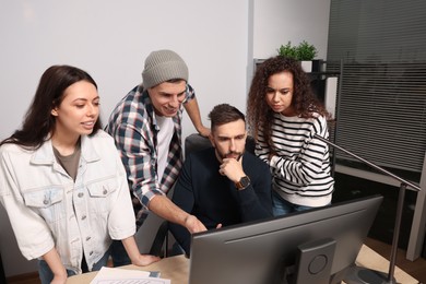 Team of employees working together in office. Startup project