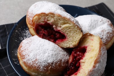 Delicious sweet buns with cherries on table, closeup